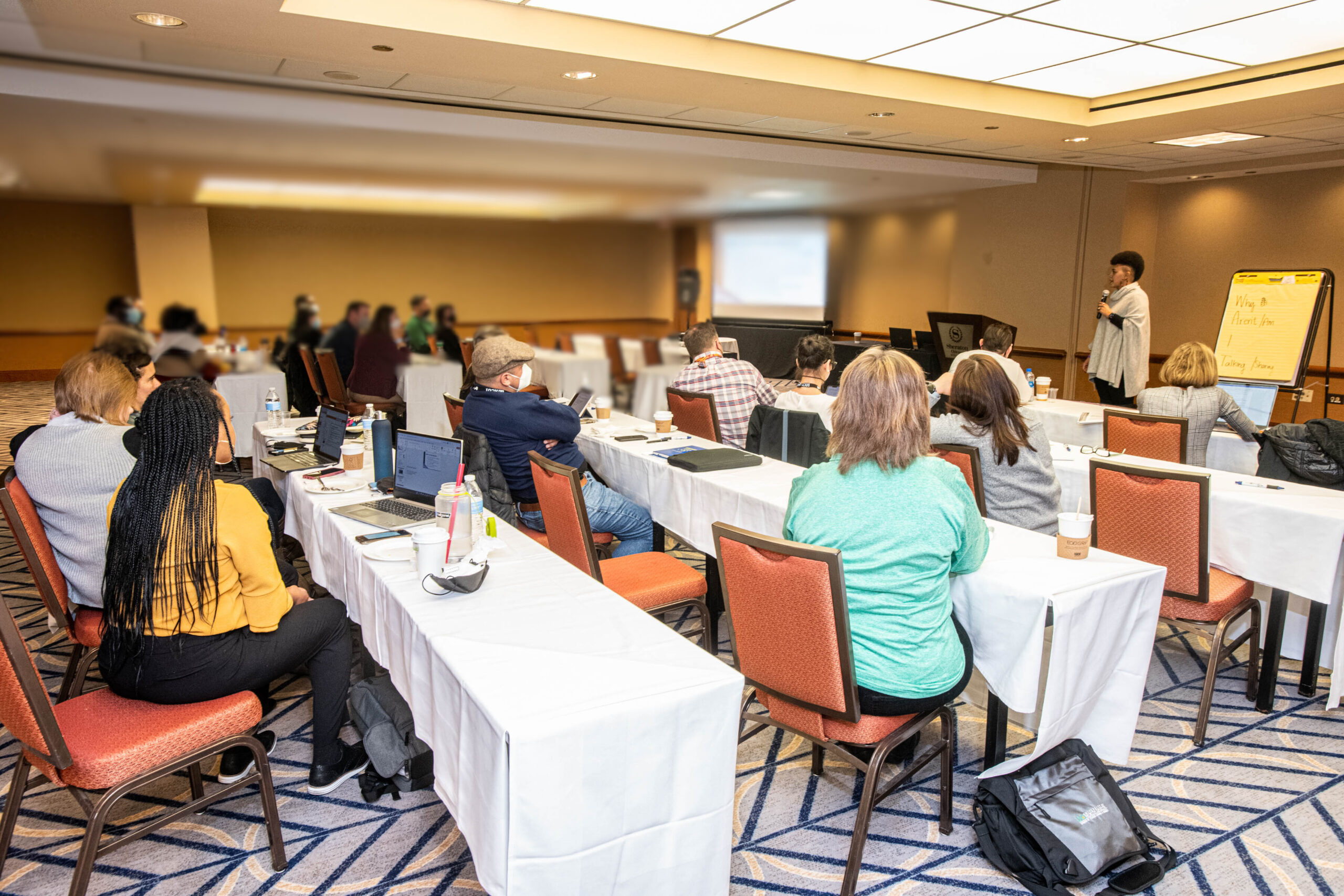 Longshot of Christina facilitating a workshop at the Association of College Unions International (ACUI) conference in 2022.